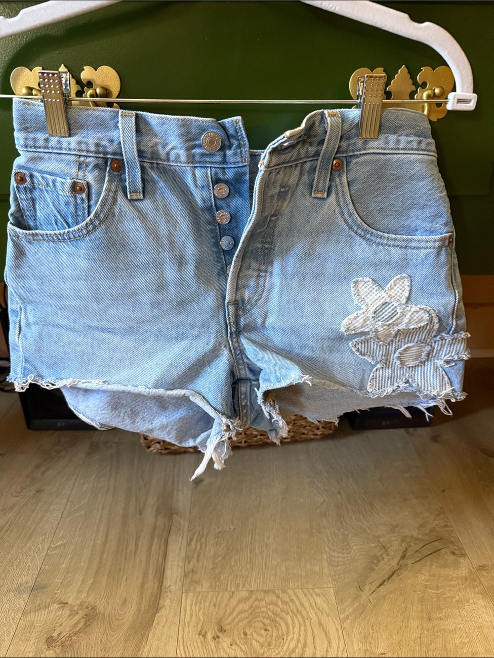 Levi's Light Blue Denim Cutoff Shorts with Floral Appliqué